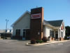 A knee wall facade for this Dunkin' Donuts store adds interest